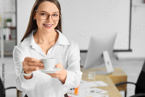 Smiling young businesswoman...