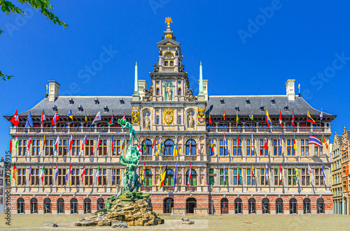 Antwerp City Hall Stadhuis Antwerpen Renaissance Architectural style building and Brabofontein Brabo Fountain on Grote Markt Big Market Square in Antwerp city centre, Antwerpen old town, Belgium