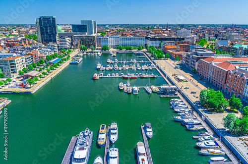Antwerp cityscape, aerial panoramic view of Antwerp city, Bonaparte Dock harbour with yachts motor boats moored in marina, skyline horizon panorama of Antwerpen old town, Flemish Region, Belgium