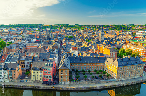Namur cityscape, aerial panoramic view of old town Namur city historical center with Sambre river embankment, skyline panorama of Namur with fields on horizon, Wallonia, Walloon Region, Belgium