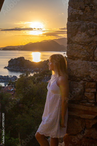 girl on the beach at sunset