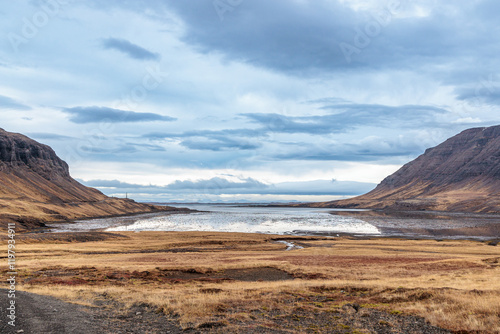 Helgafellssveit gravel road along the coast in the west of Iceland photo