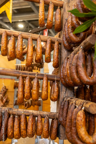 smoked sausages made of pork meat called chouricos and chicken meat called alheiras, typical gastronomy of northern portugal photo