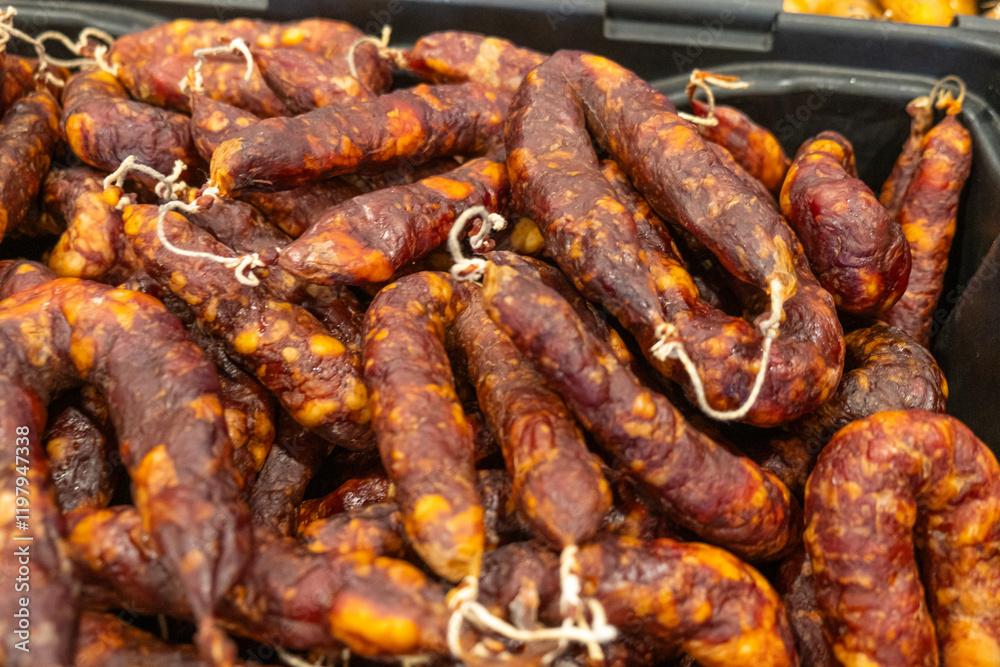 smoked sausages made of pork meat called chouricos, typical gastronomy of northern portugal. Feira do Fumeiro event. Montalegre, Portugal smoked sausages made of pork meat called chouricos, typical gastronomy of northern portugal. Feira do Fumeiro event. Montalegre, Portugal