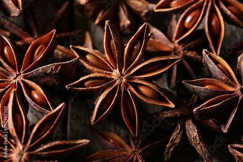 Konstfotografi Texture of anise stars on wooden background, closeup