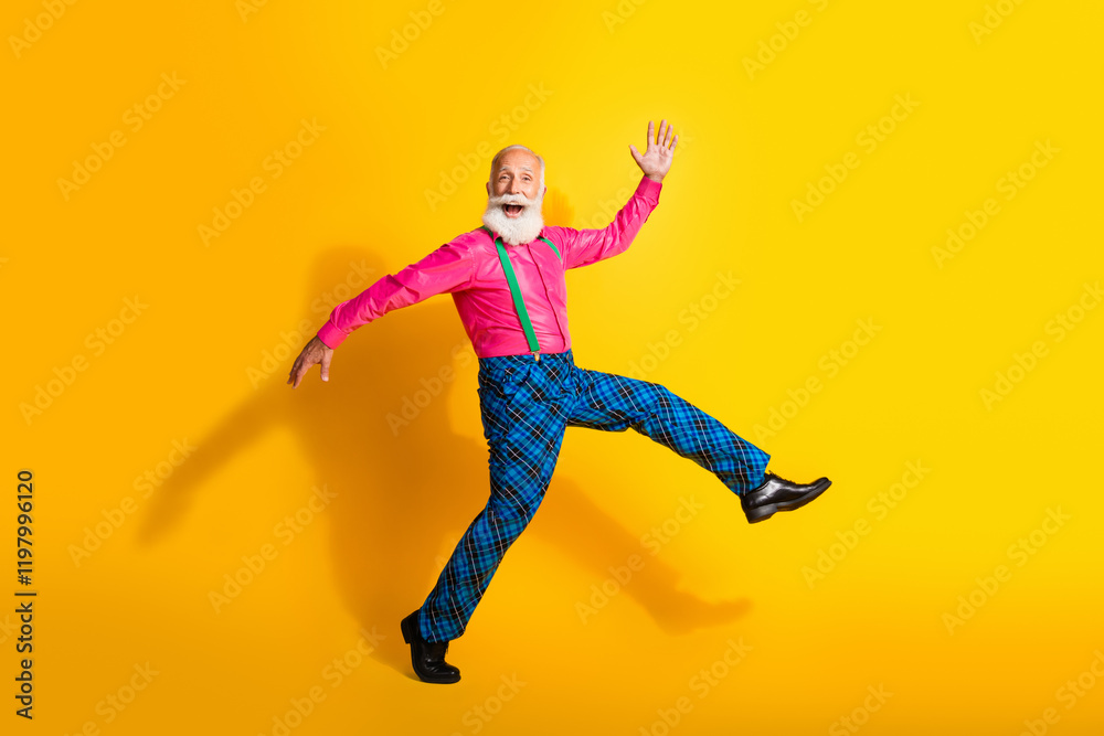 Full size photo of old gentleman excited dance walking dressed glamour stylish outfit party isolated vibrant yellow color background Full size photo of old gentleman excited dance walking dressed glamour stylish outfit party isolated vibrant yellow color background