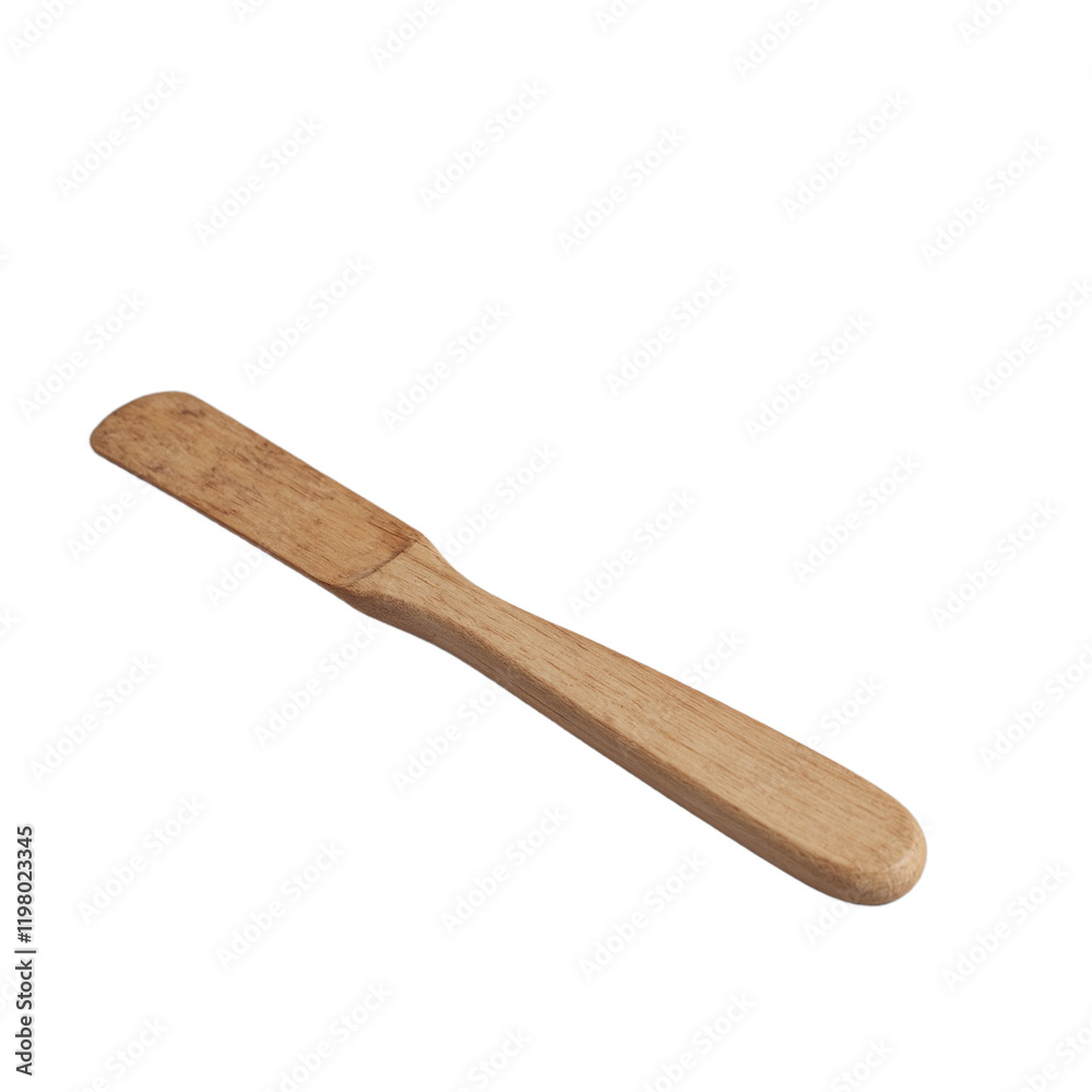 Classic wooden butter knife with a smooth finish on muted gray surface Classic wooden butter knife with a smooth finish on muted gray surface