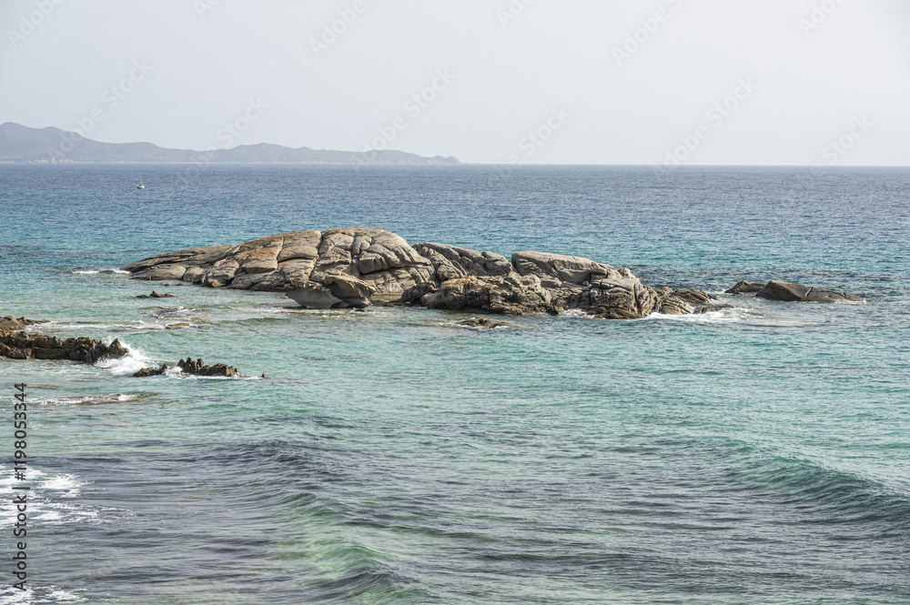 The most famous and beautiful beach of Costa Rei in Sardinia with the Peppino rock