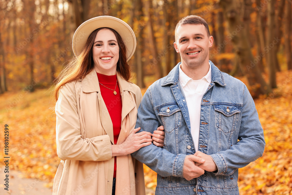 Happy couple spending time together in autumn park Happy couple spending time together in autumn park
