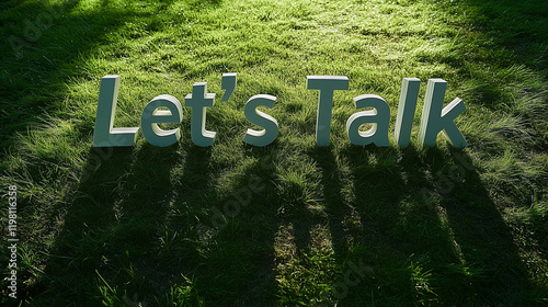 Text communication Let’s Talk conversation on grass with shadows for outdoor discussion