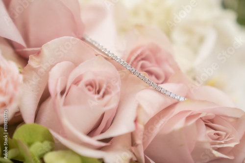 Elegant Gold Bracelet with Pink Roses and White Orchid - Bridal Jewellery on flowers photo