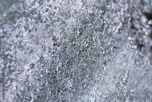 Foto Macro texture of crystallise ice block surface