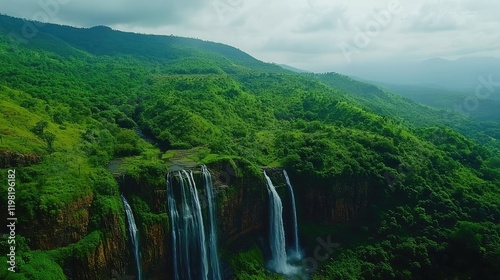 A breathtaking panoramic view of Araku Valley showcasing lush green hills and cascading waterfalls.