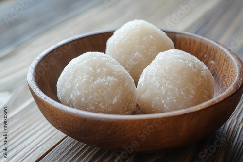 Dango is a Japanese rice based dumpling made from a blend of different rice flours photo