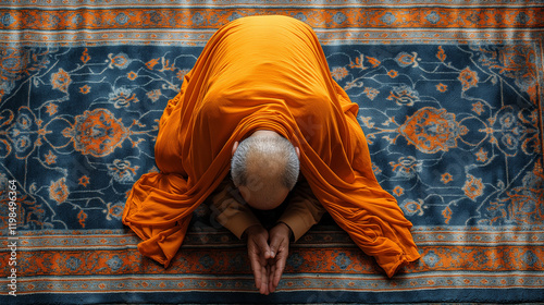  Person in prostration on a vibrant prayer mat during Ramadan