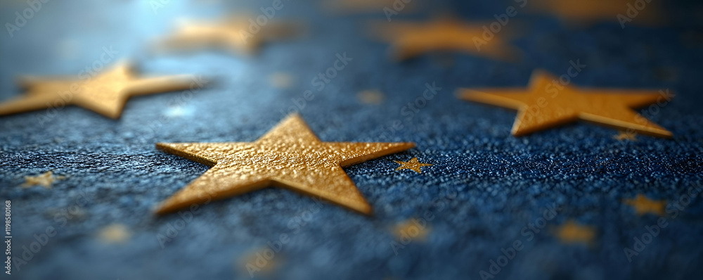 Golden stars on blue fabric background Golden stars on blue fabric background