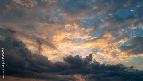 Fototapeta Naklejka Na Ścianę i Meble -  Dramatic Colorful Sunset Sky. Clouds with Sunrays. Cloudscape Nature Background. Panorama sunset sky and cloud background. Dark Clouds, Night Sky. Dark Dramatic Sky, Epic Sunset Clouds.