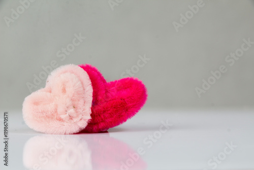 Cute red and pink heart ring props isolated on white, handmade from pipe cleaners, valentine's day background photo