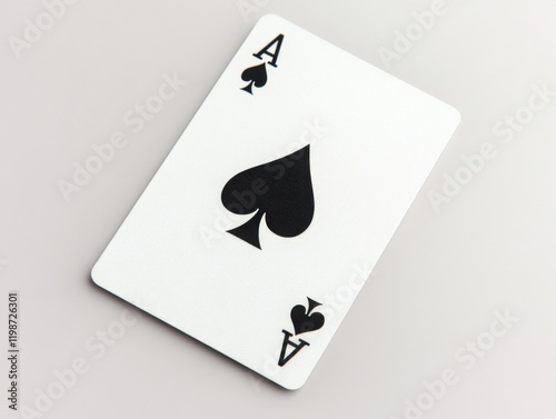 ace of spades playing card on a gray background