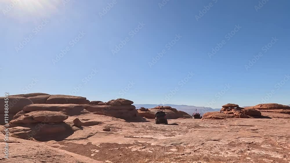 Sand Hollow red rocks extreme 4x4 Utah POV 4K. Point of view driving extreme off road vehicle. Red sandstone, dirt, sand trails. Nature erosion canyons, valley and rocks. Outdoor extreme 4x4. Sand Hollow red rocks extreme 4x4 Utah POV 4K. Point of view driving extreme off road vehicle. Red sandstone, dirt, sand trails. Nature erosion canyons, valley and rocks. Outdoor extreme 4x4.