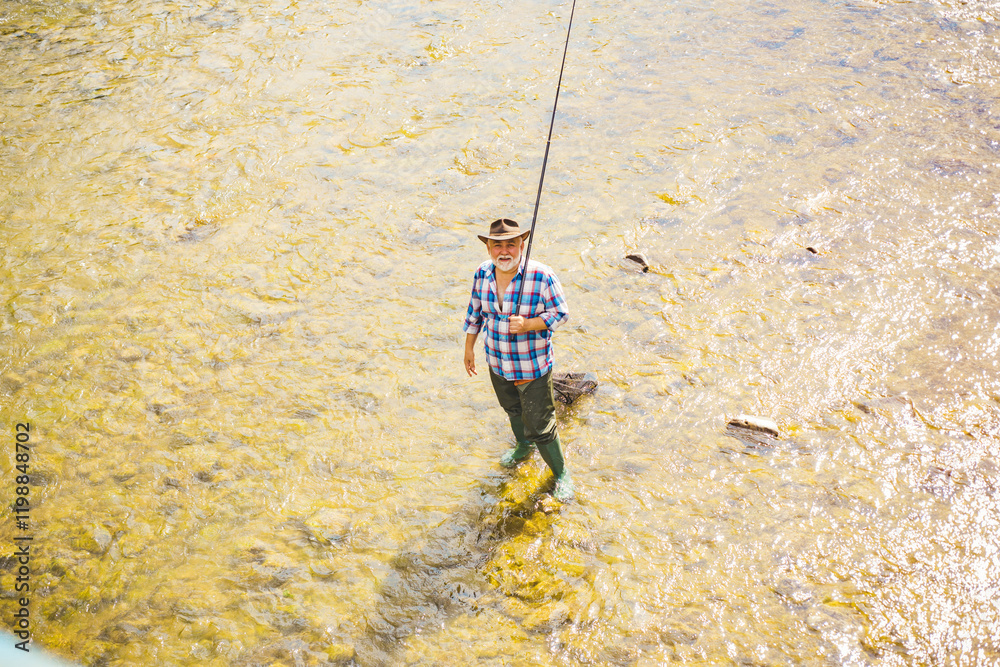 Fisherman caught a fish. Man fishing on river.