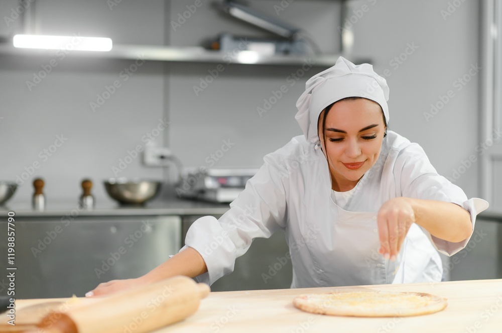 Beautiful female chef cooks cheese pizza in restaurant kitchen. The concept of semi-finished products and frozen food Beautiful female chef cooks cheese pizza in restaurant kitchen. The concept of semi-finished products and frozen food