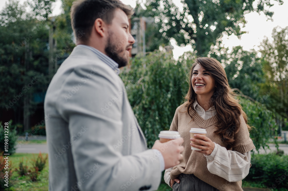 Business people enjoying a coffee break conversation in the city Business people enjoying a coffee break conversation in the city