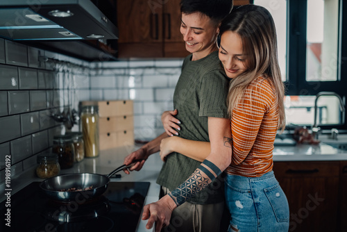 Lesbian couple cooking together in modern kitchen