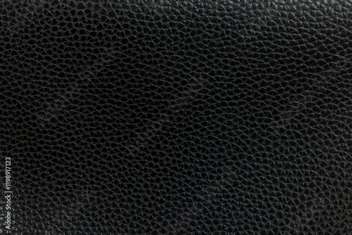 Texture of black leatherette fabric. Leather background with pronounced texture. photo