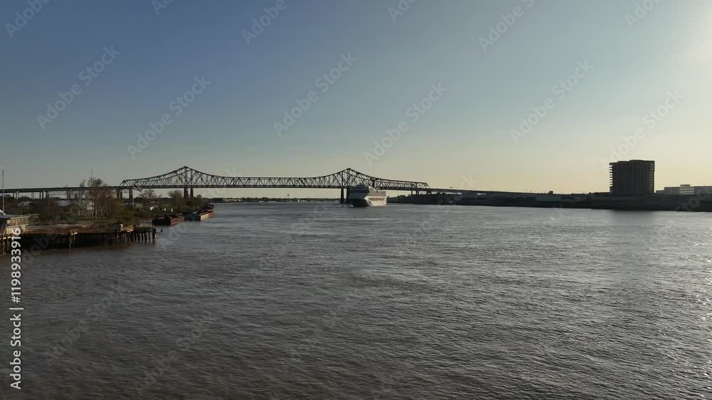 Drone view approach of a departing cruise ship in New Orleans Drone view approach of a departing cruise ship in New Orleans