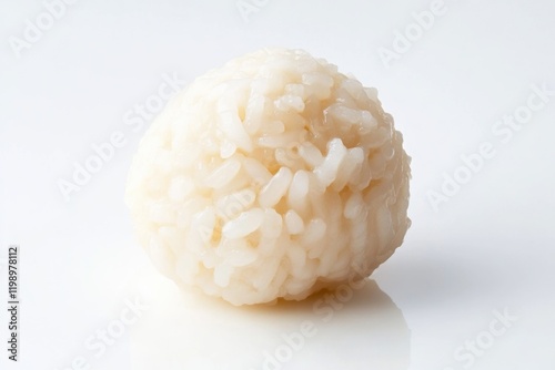 A single grain rice ball on a white background, often used in food photography and styling photo