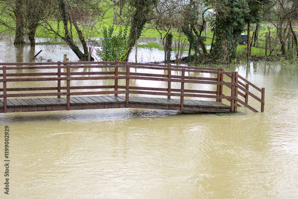 High water, flooded bridge in countryside High water, flooded bridge in countryside