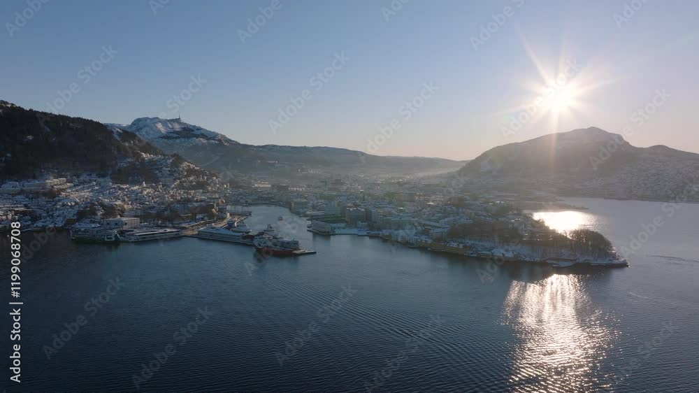 Establishing shot of Bergen and the surrounding mountains on a sunny winter day