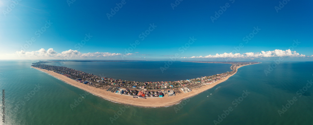 Aerial view of the spit in the sea in daylight. Top view of the sea and estuary. Zatoka, Odessa, Ukraine