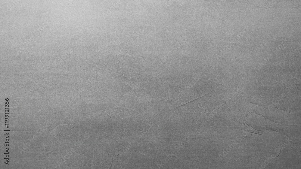 Naklejka premium A grey wall with a grey background. The wall is made of concrete and has a rough texture