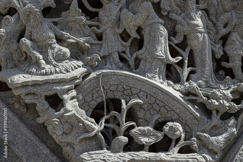 Obraz na płótnie The relief on Elaborate sculptured of Stone carvings is a beautiful Taiwanese art style. Surface texture of Stucco art in Taiwan temple, use it as your Wallpaper, Poster and Copy space,Selective focus w salonie