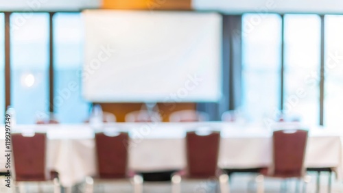 Empty Meeting Room Blur – A blurred shot of an empty meeting room with a presentation setup.	
 photo