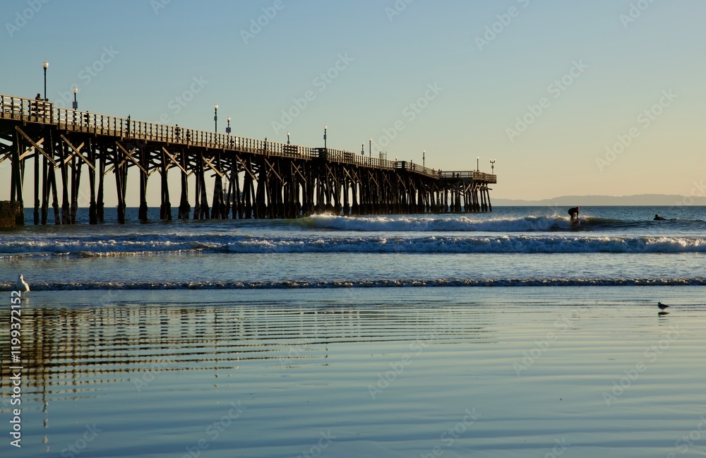 Fototapeta premium Old fashioned trestle pier at sunset