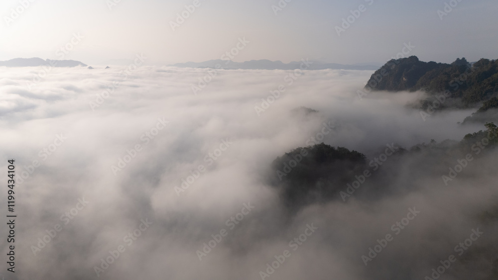 Clouds on high mountain peaks in the rainy season in the Asian rainforest.. Clouds on high mountain peaks in the rainy season in the Asian rainforest..
