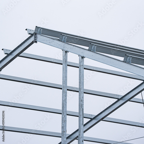 Obraz na płótnie Fast construction of a hall made of steel elements - assembly process - stainless steel w salonie