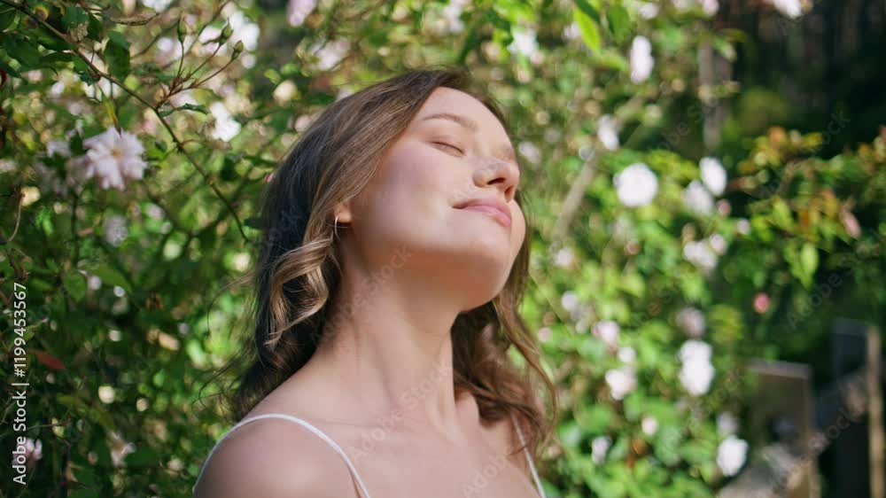 Romantic woman contemplating nature relaxing in park feeling peaceful closeup Romantic woman contemplating nature relaxing in park feeling peaceful closeup