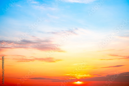 Sky,sunset, beautiful , luxury soft gradient orange gold clouds and sunlight on the blue sky perfect for the background, Sunrise on morning or everning in winter warm time ,Twilight summer,silhouette photo