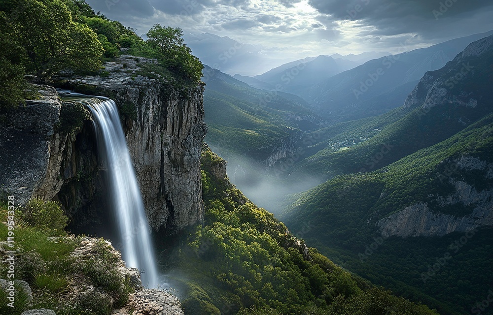 custom made wallpaper toronto digitalPhoto of a waterfall cascading down a cliff in a mountainous area