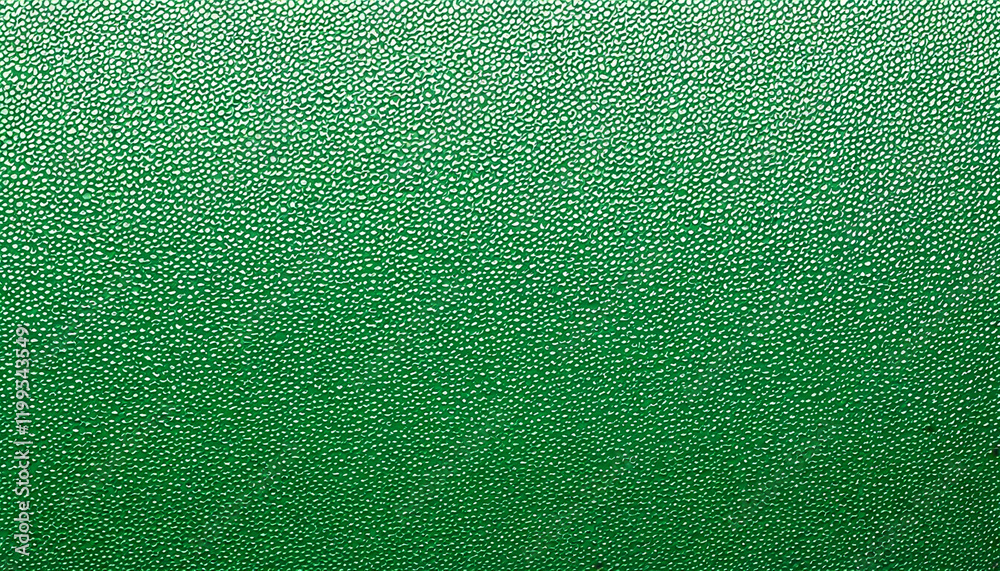 Fototapeta premium Textured surface showcases vibrant green hues in a unique design