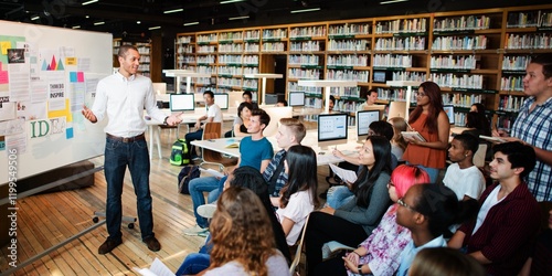 Slika na platnu A diverse group of people in a library setting, listening to a presentation
