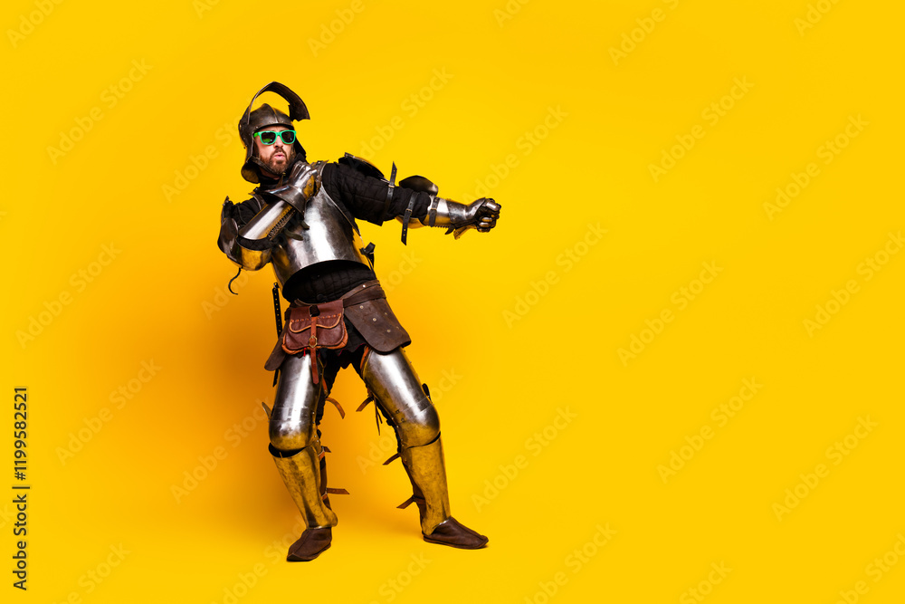 Medieval Knight with Sunglasses and Playful Pose on Vibrant Yellow Background Medieval Knight with Sunglasses and Playful Pose on Vibrant Yellow Background