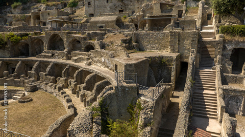 Aerial closeup of the archaeological park of Baia, a hamlet of Bacoli, near Naples, in Campania, Italy. It was an ancient Roman town situated on the Cumaean Peninsula in the Phlegraean Fields. photo