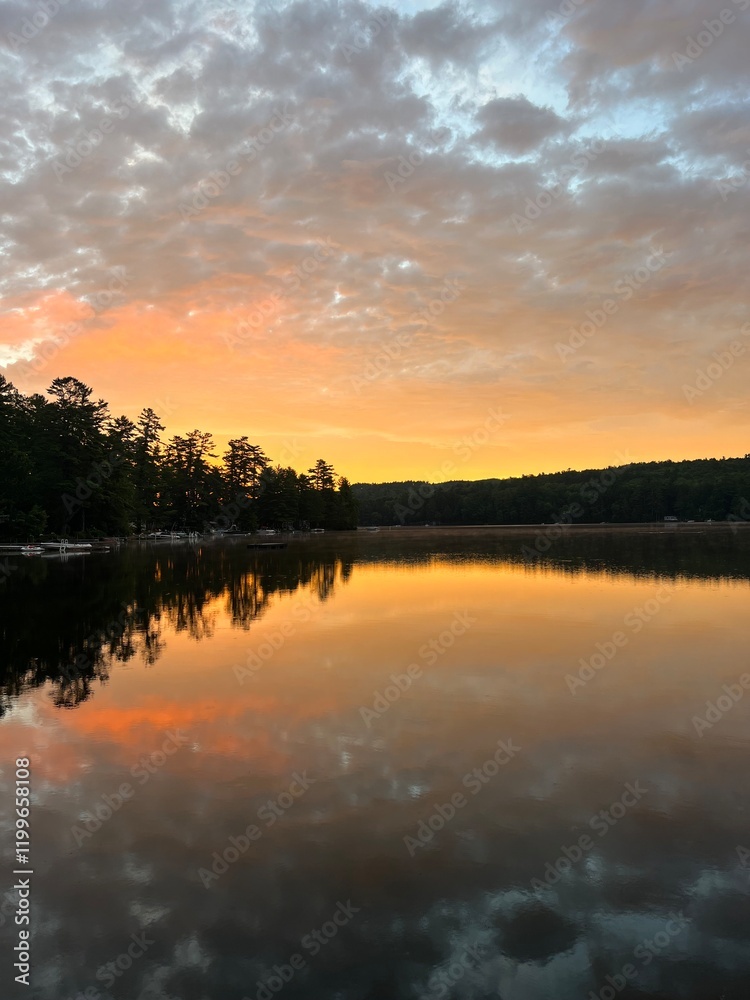 Serene Sunset Over Calm Lake with Vibrant Reflections Serene Sunset Over Calm Lake with Vibrant Reflections