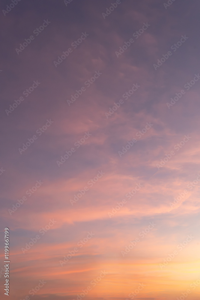 Dramatic cloudscape ablaze with orange and red hues as the sun descends, painting the evening sky with vibrant colors Dramatic cloudscape ablaze with orange and red hues as the sun descends, painting the evening sky with vibrant colors