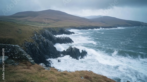 Dramatic Coastal Cliffs and Ocean Waves Crashing Against Rocky Shore photo